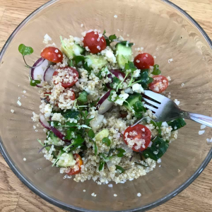 A photo of quinoa and veggies in a bowl