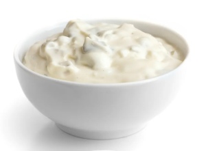 A white bowl filled with Tartar sauce 