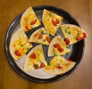 A plate of mini pizza slices