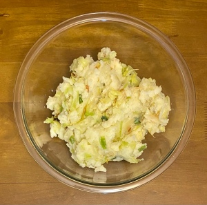 A glass bowl full of Colcannon 