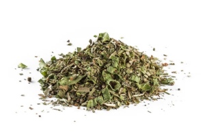 A pile of dried herbs on a white background