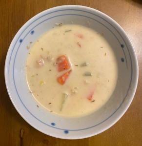 A small bowl of salmon chowder 